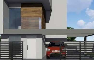 Imagem: A casa possui 3 Dormitórios, 2 Banheiros, 2 Vagas na garagem