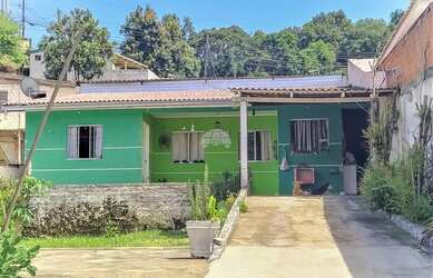 Imagem: A casa possui 2 Dormitórios, 1 Banheiro, 1 Vaga na garagem