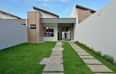 Imagem: A casa possui 2 Dormitórios, 2 Banheiros, 2 Vagas na garagem