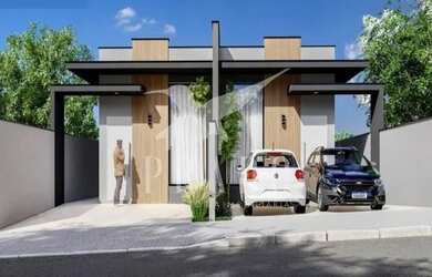 Imagem: A casa possui 3 Dormitórios, 2 Banheiros, 2 Vagas na garagem