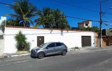 Imagem: A casa possui 4 Dormitórios, 4 Banheiros, 5 Vagas na garagem