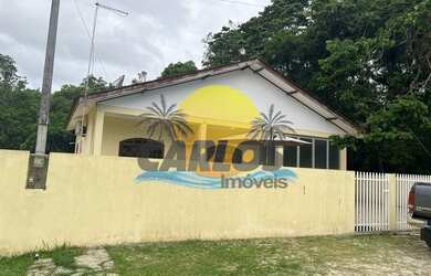 Imagem: A casa possui 3 Dormitórios, 2 Banheiros, 2 Vagas na garagem