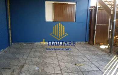 Imagem: A casa possui 3 Dormitórios, 1 Banheiro, 1 Vaga na garagem