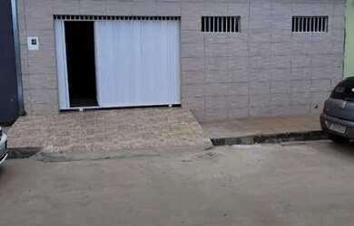 Imagem: A casa possui 2 Dormitórios, 2 Banheiros, 3 Vagas na garagem