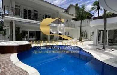 Imagem: A casa em condomínio possui 5 Dormitórios, 5 Banheiros, 4