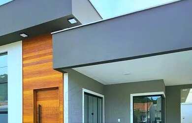 Imagem: A casa possui 3 Dormitórios, 3 Banheiros, 2 Vagas na garagem