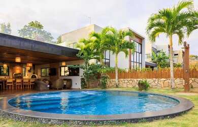 Imagem: A casa em condomínio à venda possui 5 Dormitórios, 5 Banheiros