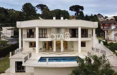 Imagem: A casa em condomínio possui 5 Dormitórios, 5 Banheiros, 5