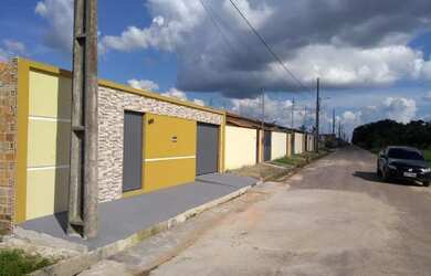 Imagem: A casa possui 2 Dormitórios, 2 Banheiros, 2 Vagas na garagem