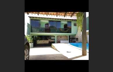 Imagem: A casa possui 2 Dormitórios, 4 Banheiros, 4 Vagas na garagem