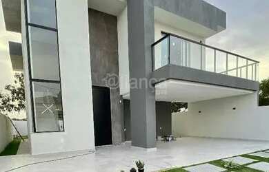 Imagem: A casa possui 4 Dormitórios, 4 Banheiros, 2 Vagas na garagem