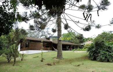 Imagem: A casa em condomínio possui 3 Dormitórios, 4 Banheiros, 5