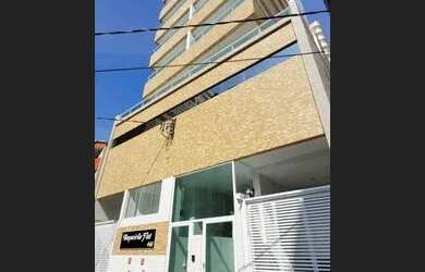 Imagem: O apartamento possui 1 Dormitório, 1 Banheiro, 2 Vagas na garagem