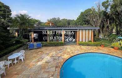 Imagem: A casa em condomínio possui 4 Dormitórios, 5 Banheiros, 5