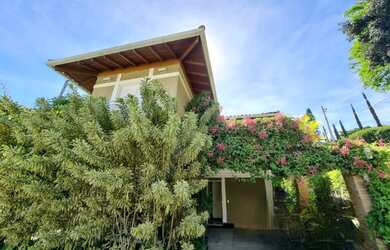 Imagem: A casa em condomínio à venda possui 4 Dormitórios, 3 Banheiros