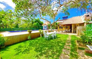 Imagem: A casa em condomínio possui 5 Dormitórios, 5 Banheiros, 4