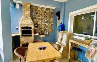 Imagem: A casa possui 4 Dormitórios, 4 Banheiros, 4 Vagas na garagem