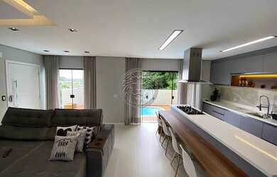 Imagem: A casa possui 2 Dormitórios, 3 Banheiros, 2 Vagas na garagem