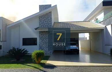 Imagem: A casa possui 3 Dormitórios, 2 Banheiros, 4 Vagas na garagem