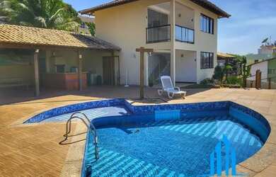 Imagem: A casa possui 5 Dormitórios, 5 Banheiros, 5 Vagas na garagem