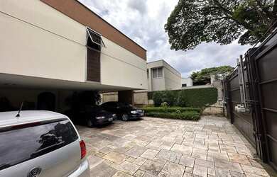 Imagem 7: Casa no jardim Europa. Churrasqueira, Varanda, Guarda roupaeLareira