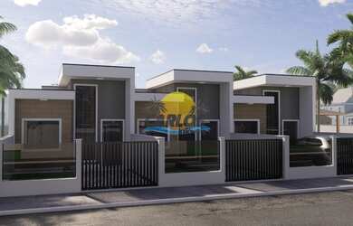 Imagem: A casa possui 3 Dormitórios, 2 Banheiros, 2 Vagas na garagem