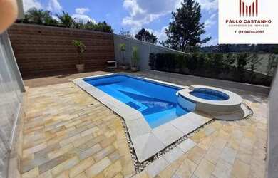 Imagem: A casa em condomínio possui 4 Dormitórios, 5 Banheiros, 4