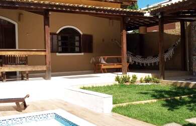 Imagem: A casa possui 3 Dormitórios, 2 Vagas na garagem e está localizado