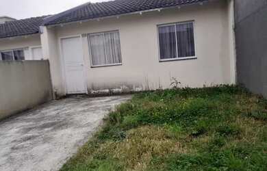 Imagem: A casa em condomínio possui 2 Dormitórios, 1 Banheiro, 2 Vagas