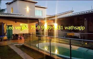 Imagem: A casa possui 3 Dormitórios, 3 Banheiros, 4 Vagas na garagem