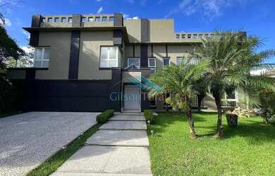 Imagem: A casa em condomínio possui 5 Dormitórios, 5 Banheiros, 1.100m²