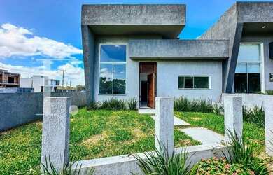 Imagem: A casa possui 2 Dormitórios, 3 Banheiros, 2 Vagas na garagem