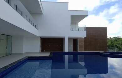 Imagem: A casa em condomínio possui 5 Dormitórios, 5 Banheiros, 5