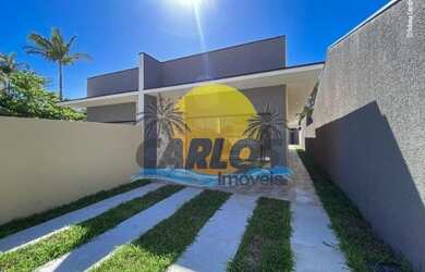 Imagem: A casa possui 3 Dormitórios, 3 Banheiros, 2 Vagas na garagem