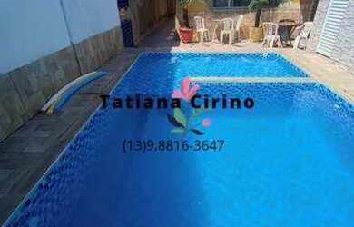 Imagem: A casa possui 2 Dormitórios, 2 Vagas na garagem e está localizado