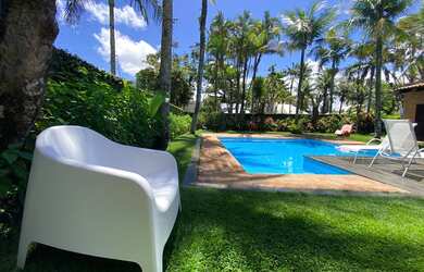 Imagem: A casa possui 5 Dormitórios, 5 Banheiros, 3 Vagas na garagem