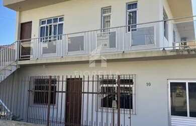 Imagem: A casa possui 5 Dormitórios, 4 Banheiros, 2 Vagas na garagem