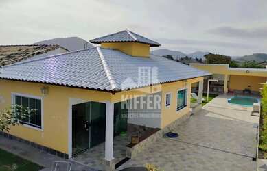 Imagem: A casa possui 3 Dormitórios, 4 Banheiros, 4 Vagas na garagem