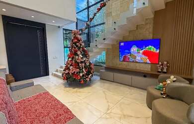 Imagem: A casa em condomínio possui 4 Dormitórios, 5 Banheiros, 4