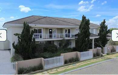 Imagem: A casa em condomínio possui 5 Dormitórios, 5 Banheiros, 5