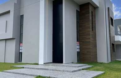 Imagem: A casa em condomínio possui 4 Dormitórios, 5 Banheiros, 4