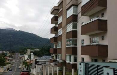 Imagem: O apartamento possui 3 Dormitórios, 1 Banheiro, 2 Vagas na