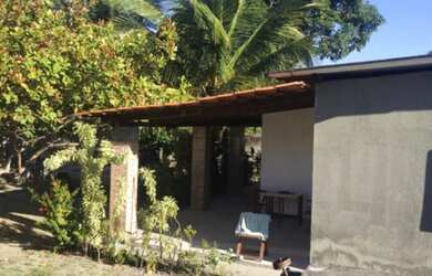 Imagem: A casa possui 3 Dormitórios, 2 Banheiros, 3 Vagas na garagem