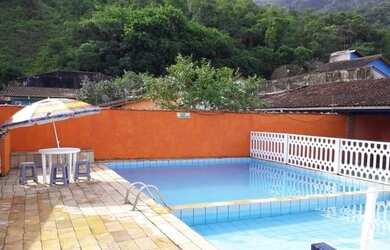 Imagem: O quarto possui 5 Dormitórios e 5 Vagas na garagem e está