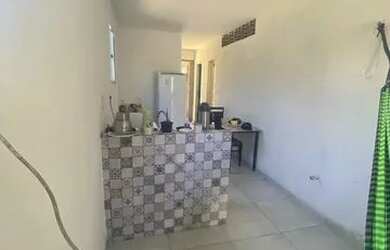 Imagem: A casa possui 2 Dormitórios, 1 Banheiro, 1 Vaga na garagem