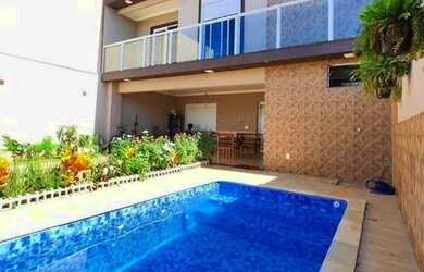 Imagem: A casa possui 4 Dormitórios, 2 Banheiros, 1 Vaga na garagem