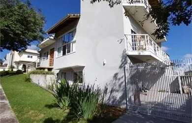 Imagem: A casa em condomínio possui 4 Dormitórios, 5 Banheiros, 4