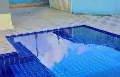 Imagem: A casa possui 3 Dormitórios, 4 Banheiros, 4 Vagas na garagem