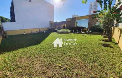 Imagem: A casa possui 4 Dormitórios, 3 Banheiros, 5 Vagas na garagem