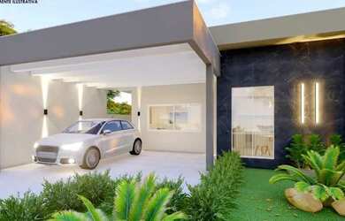 Imagem: A casa possui 3 Dormitórios, 2 Banheiros, 2 Vagas na garagem